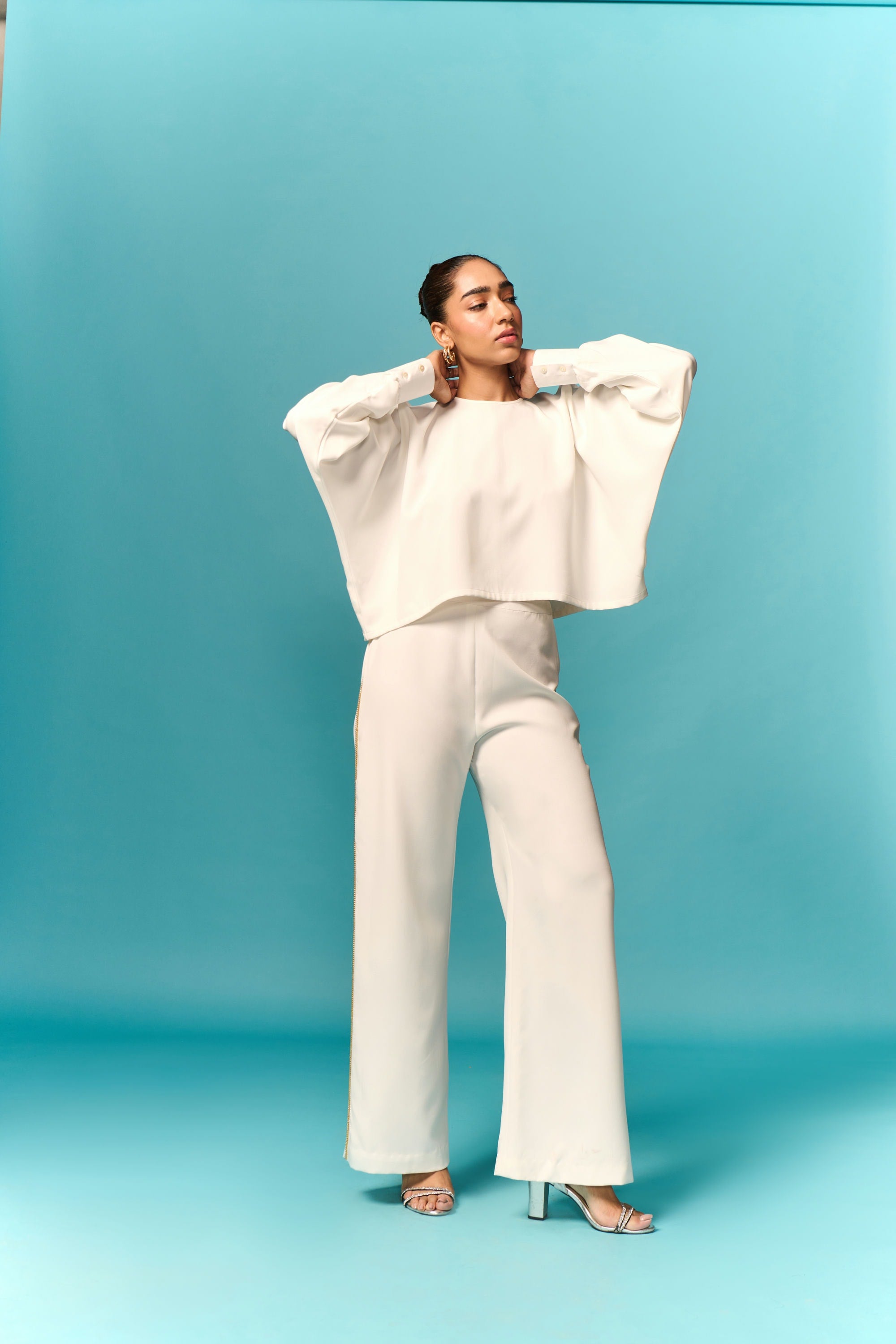 White cut-out loose top with embellished trouser