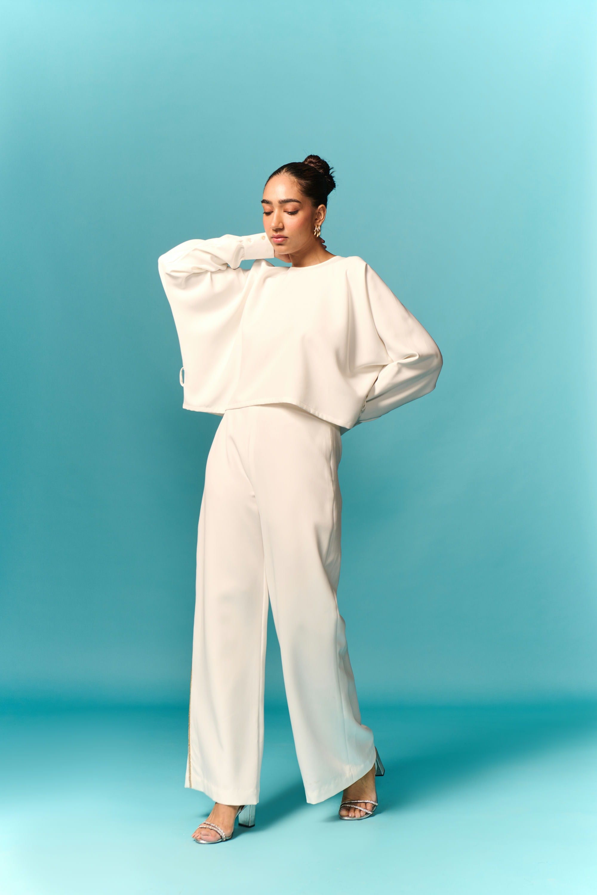 White cut-out loose top with embellished trouser