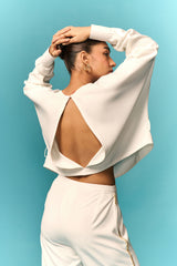 White cut-out loose top with embellished trouser