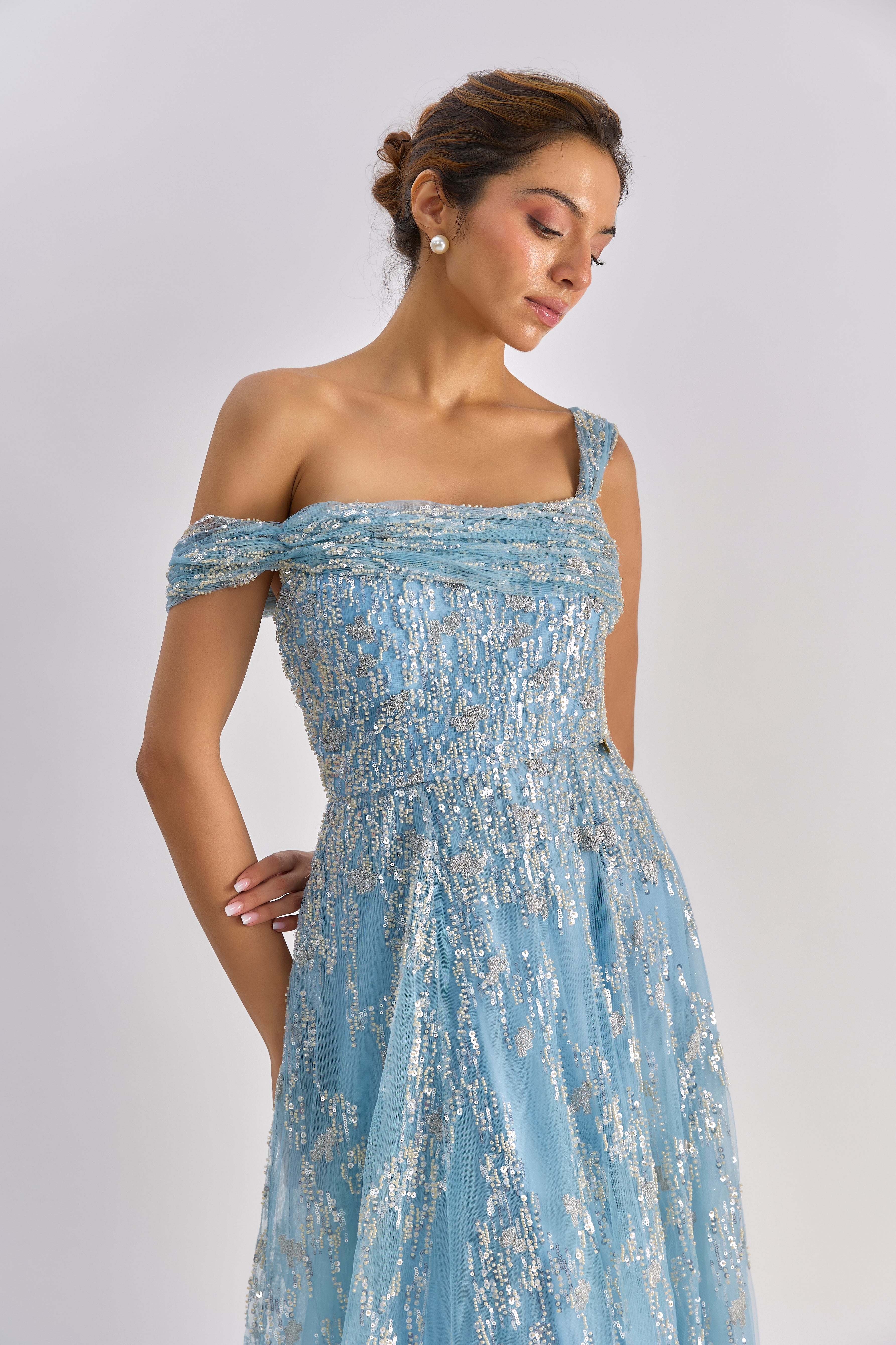 Sea blue embellished drape one shoulder gown