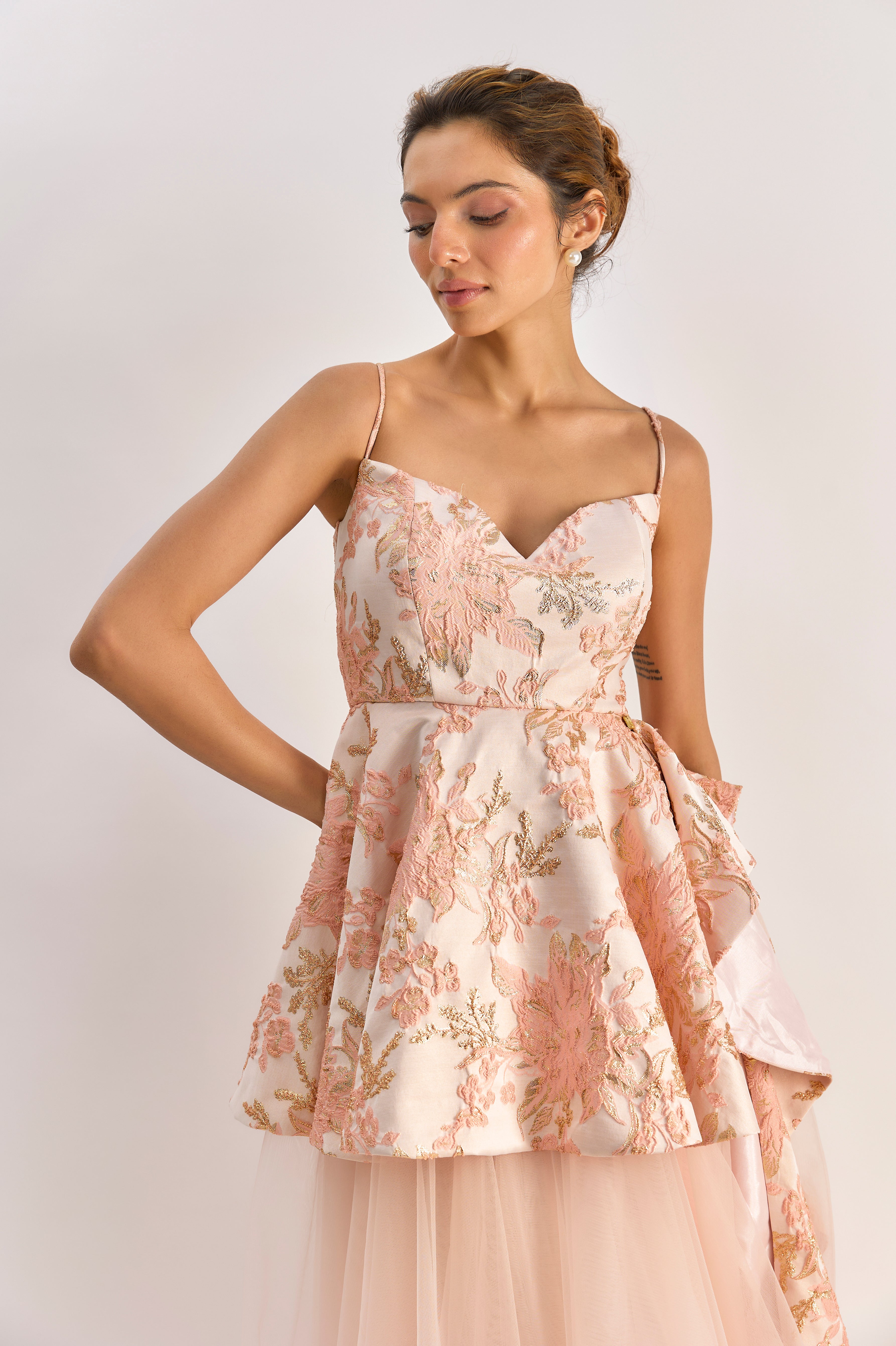 Light pink textured brocade tulle gown