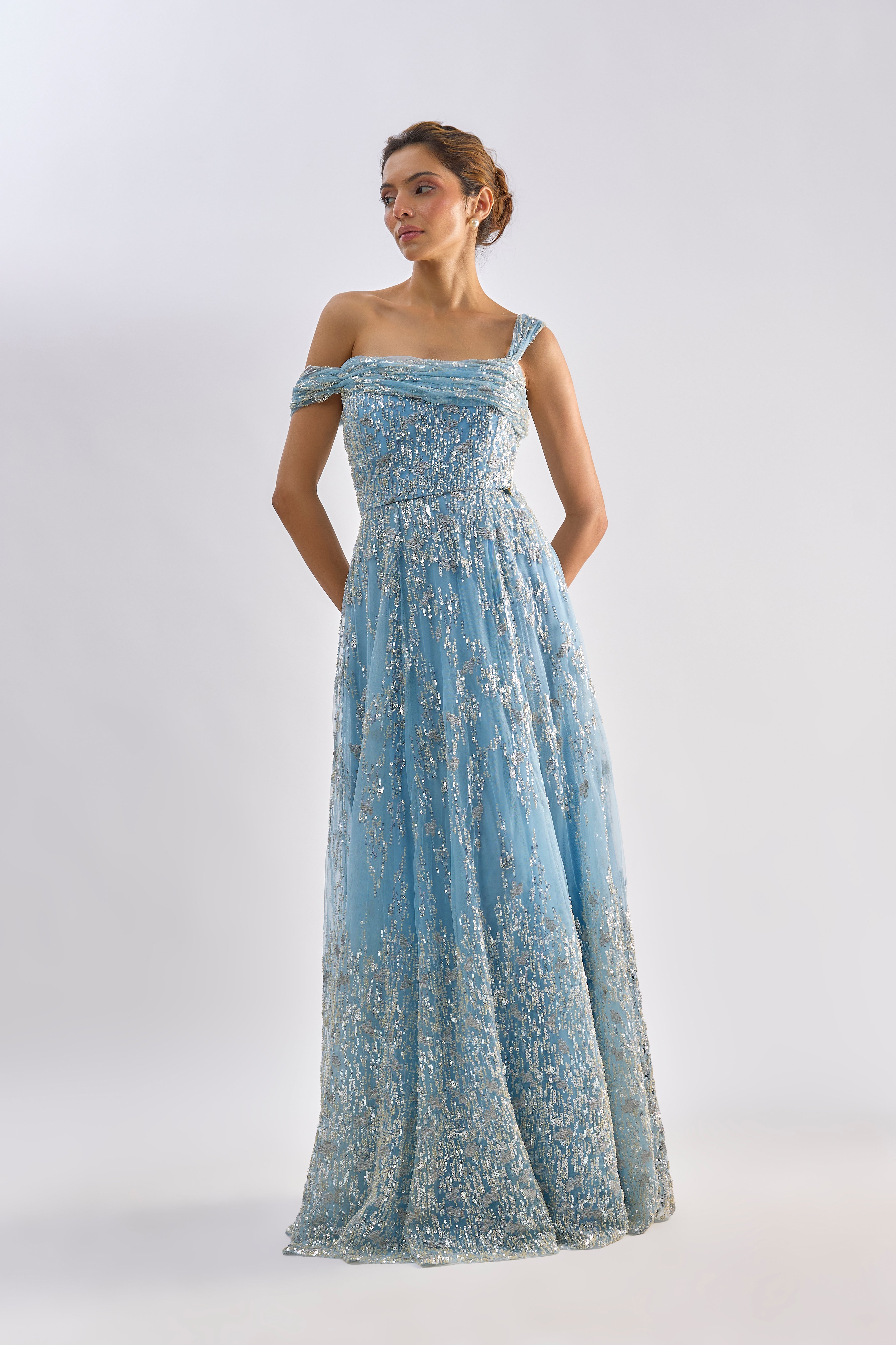 Sea blue embellished drape one shoulder gown