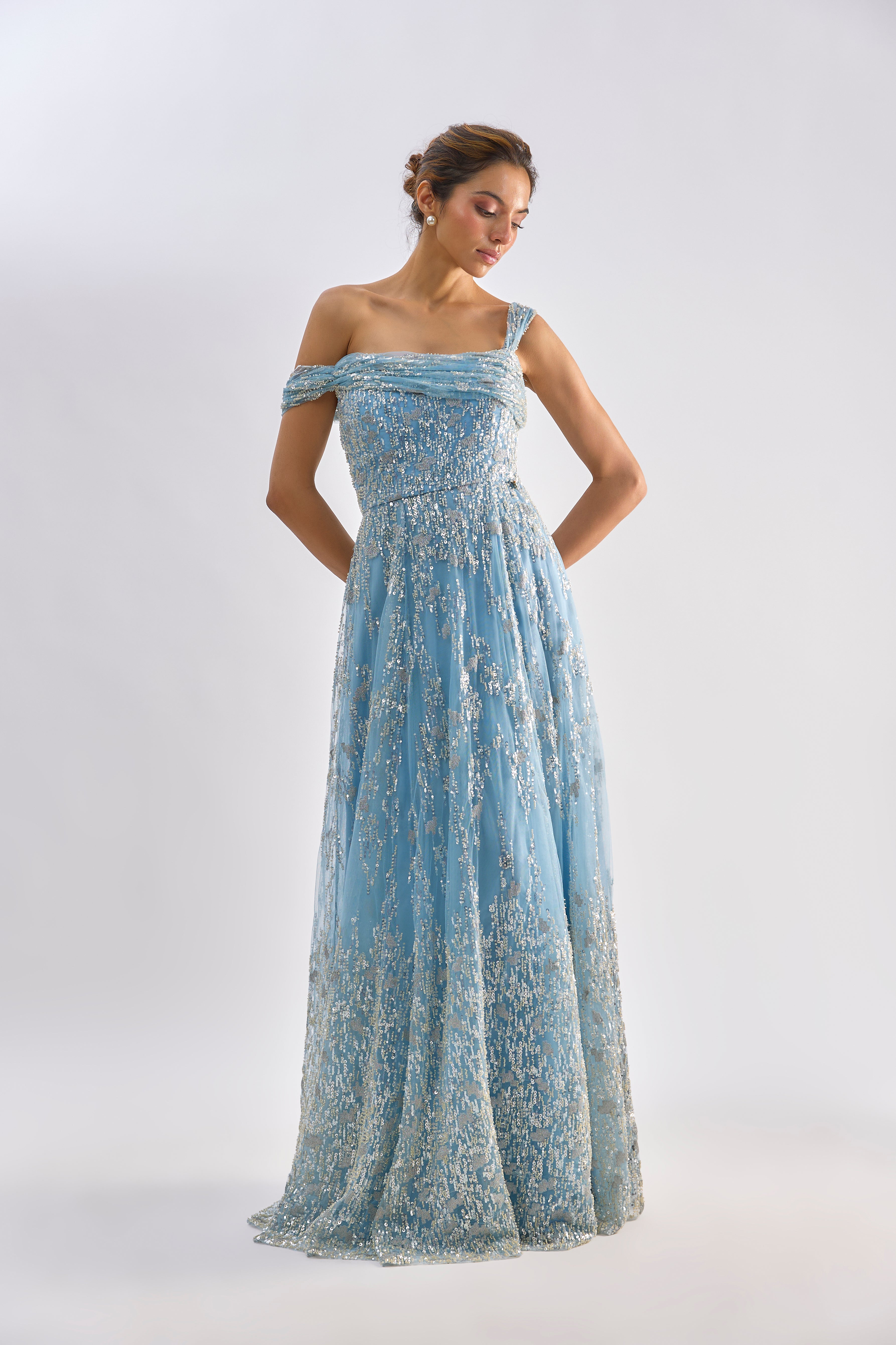 Sea blue embellished drape one shoulder gown