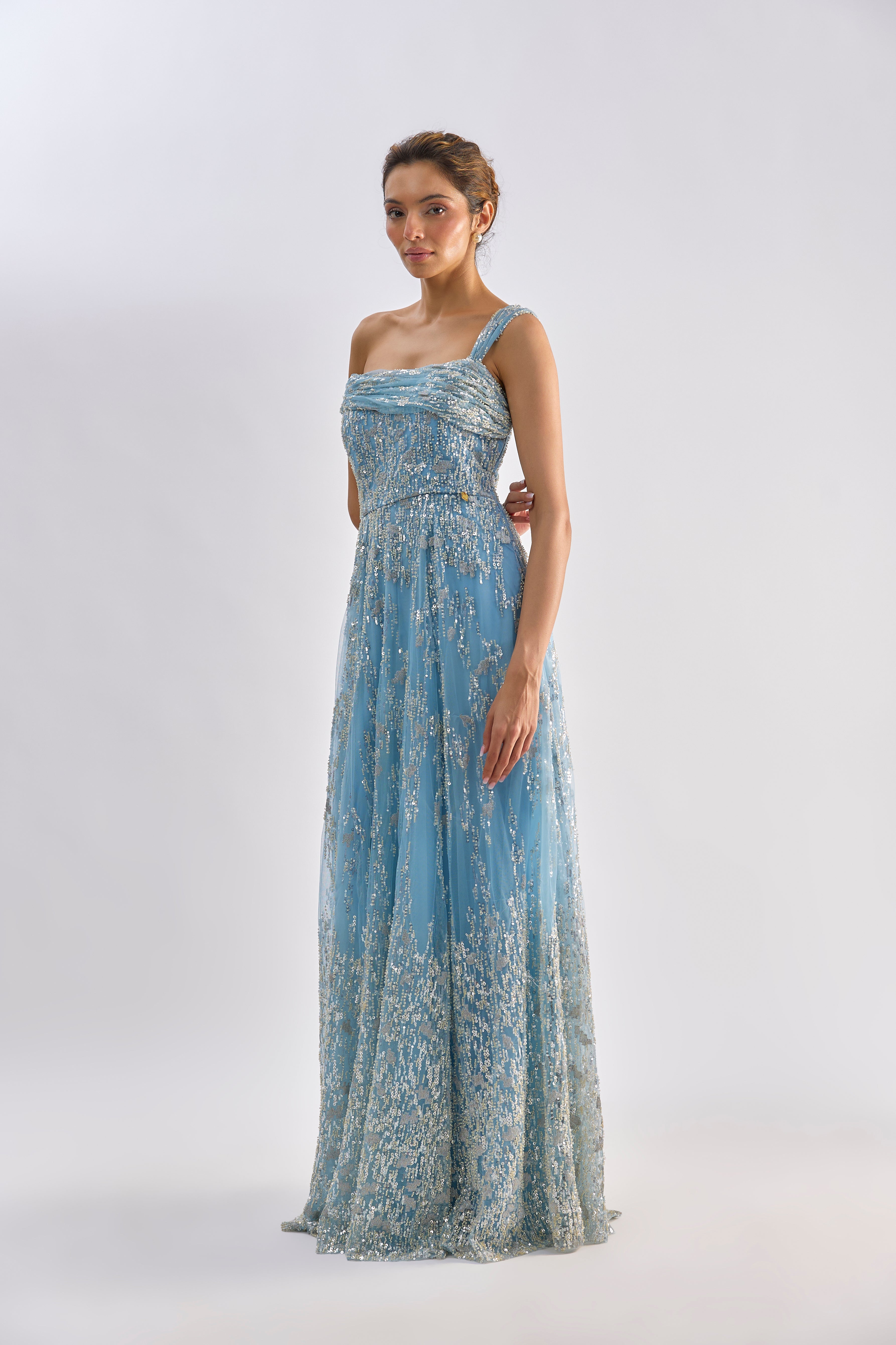 Sea blue embellished drape one shoulder gown