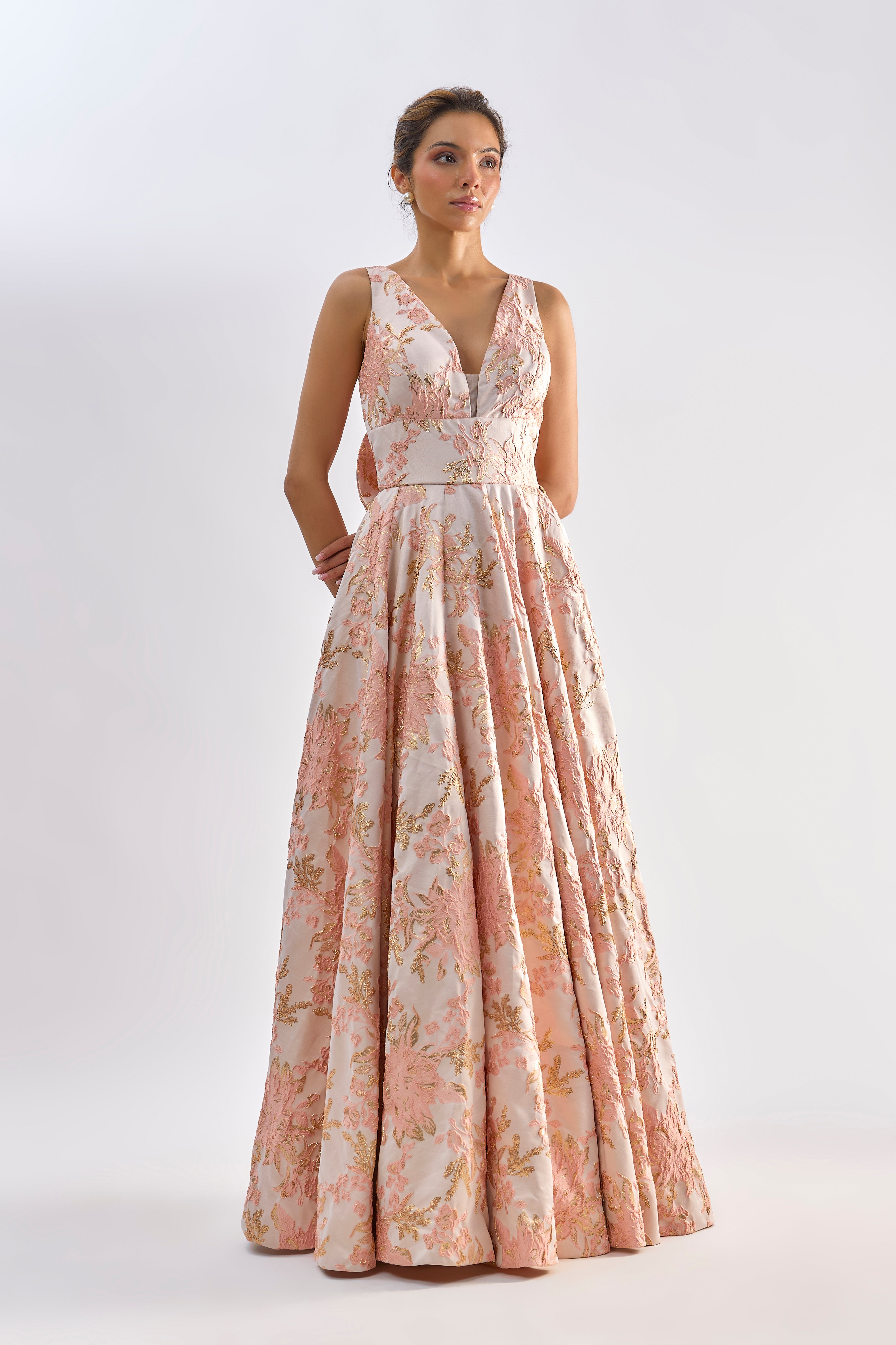 Pink floral textured jacqard gown with back bow detailing