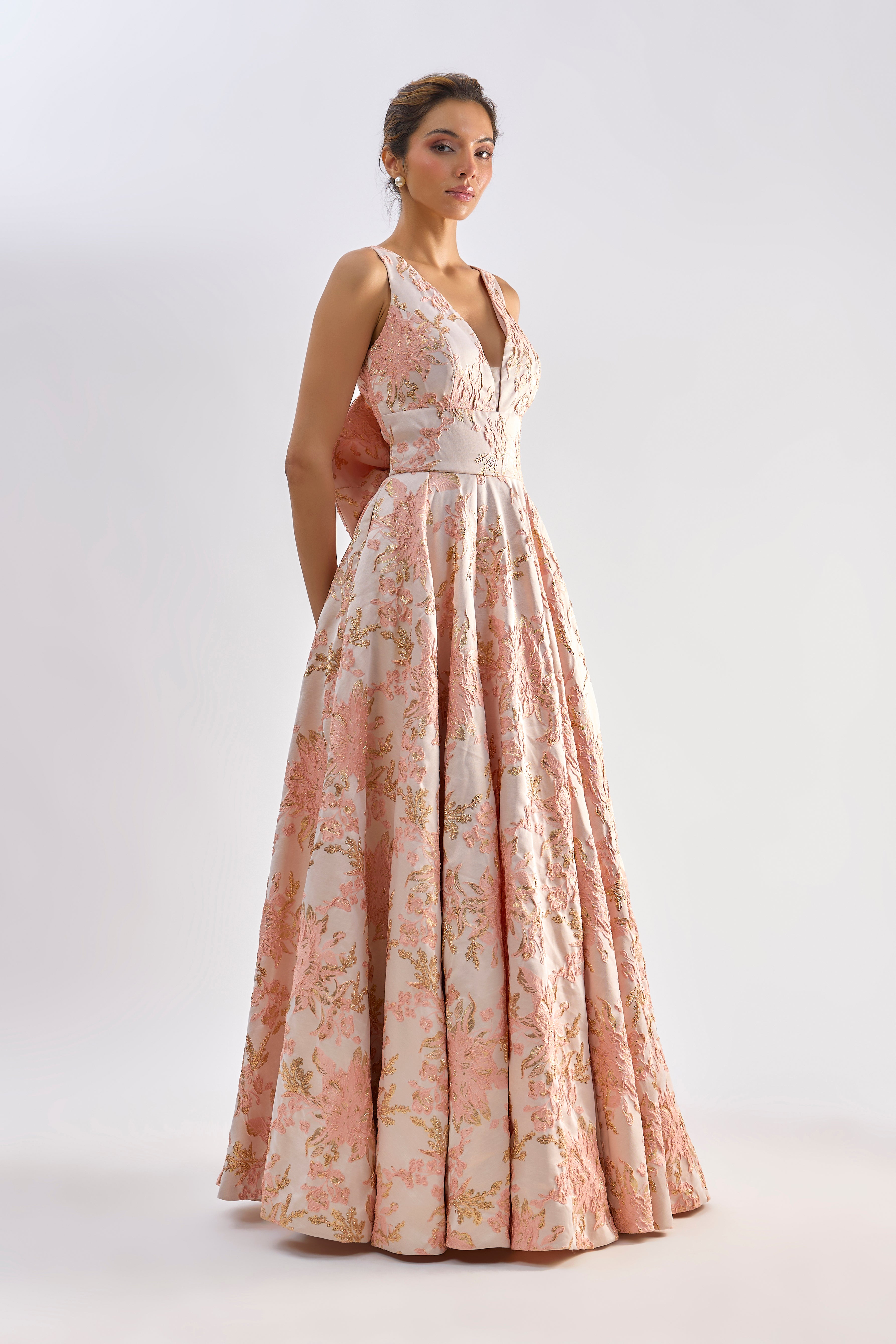 Pink floral textured jacqard gown with back bow detailing