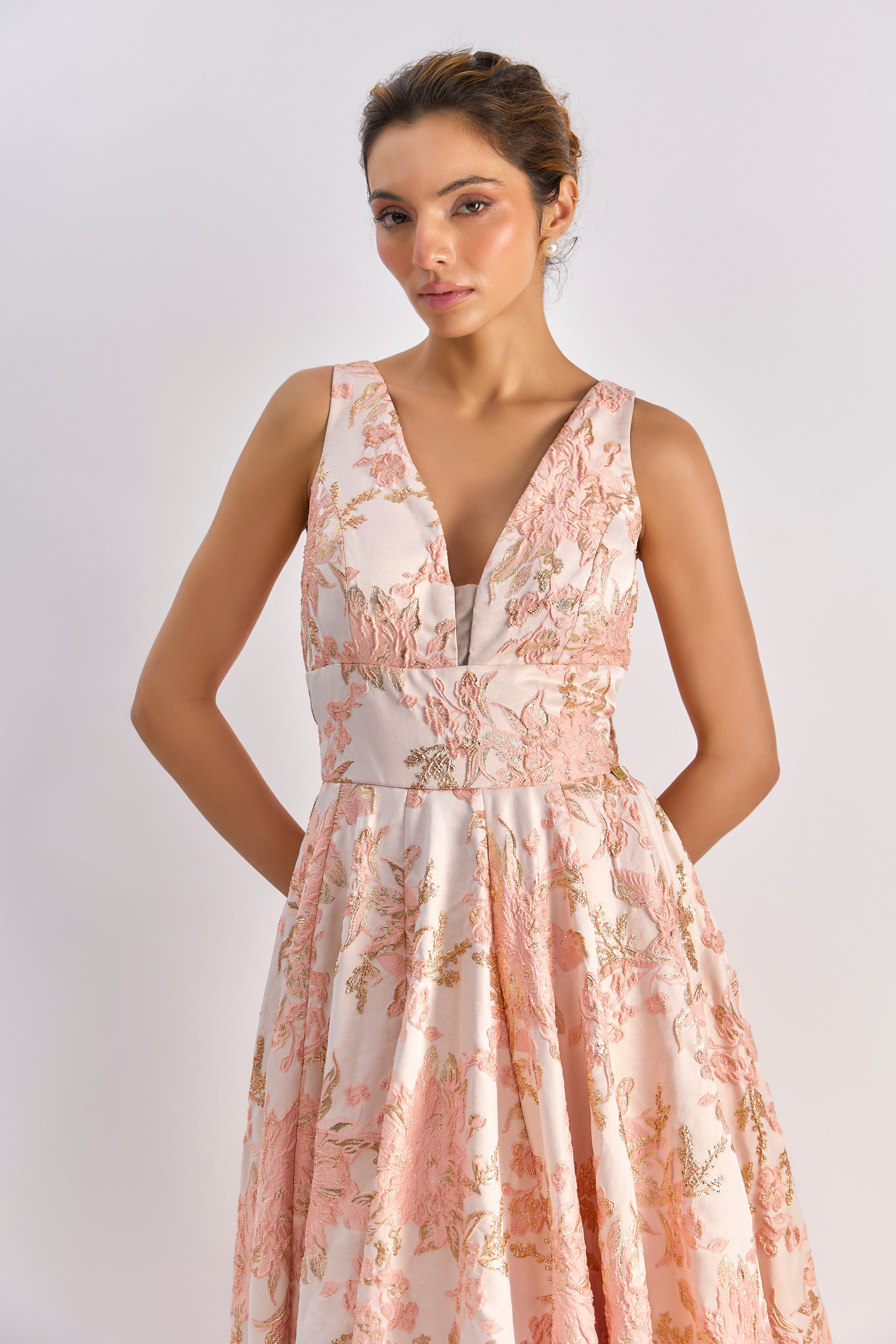 Pink floral textured jacqard gown with back bow detailing