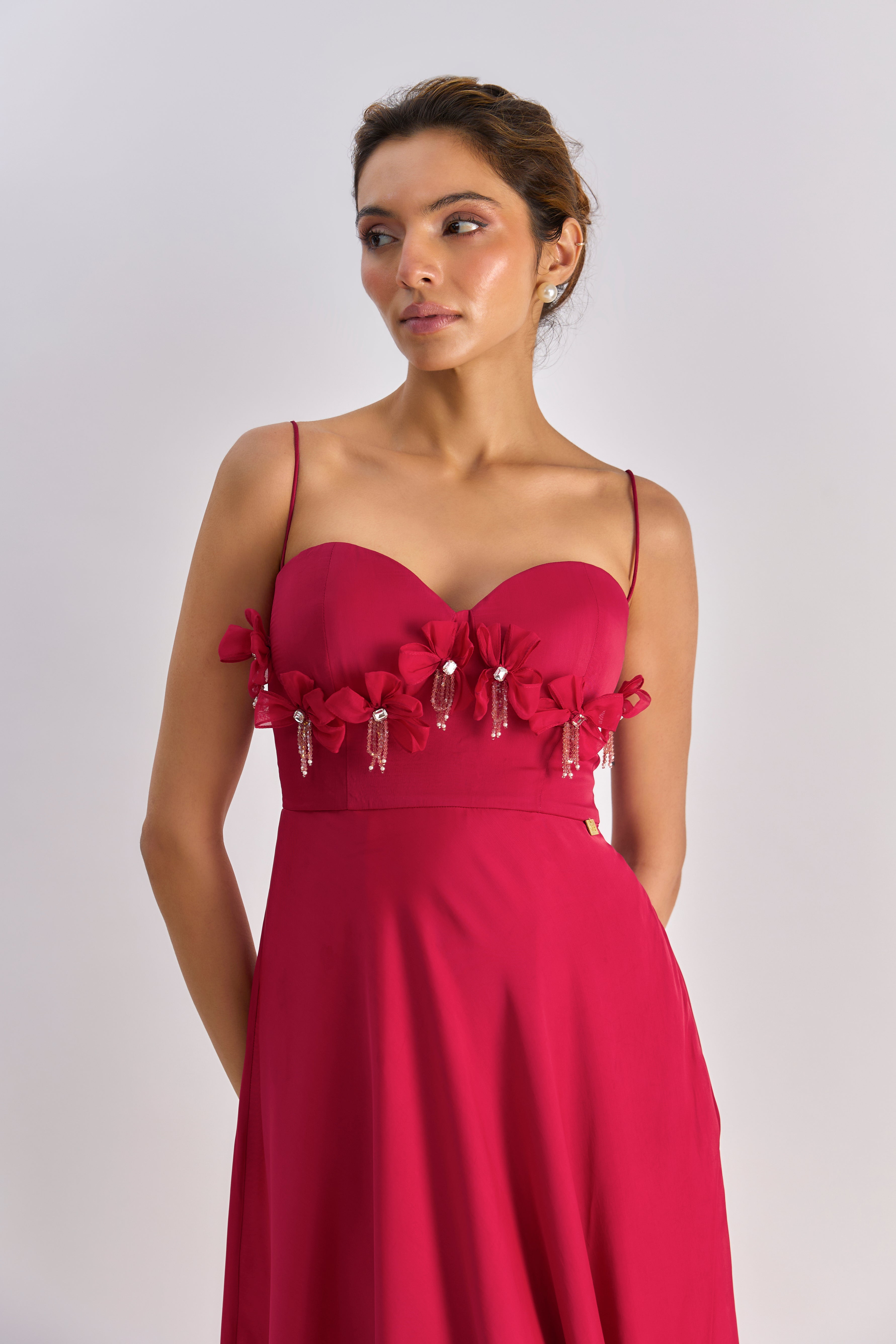 Crimson red embellished bow detailing flayered dress