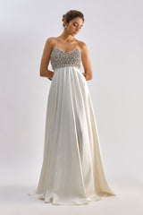 White brocade embellished gown with pockets