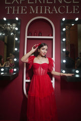 SARA KUKREJA IN RED TULLE DRESS